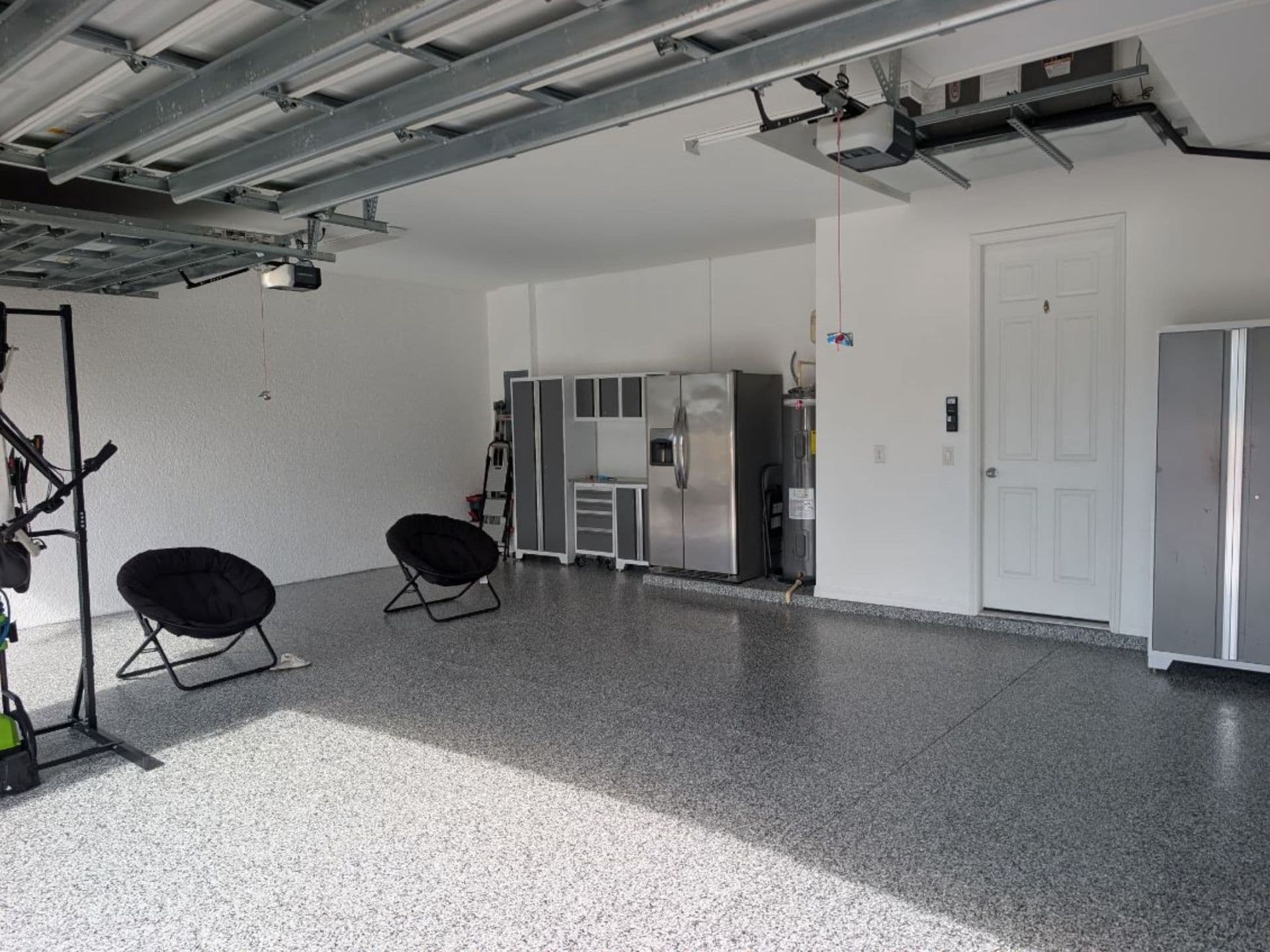 A garage floor coating showing the protective results of concrete resurfacing